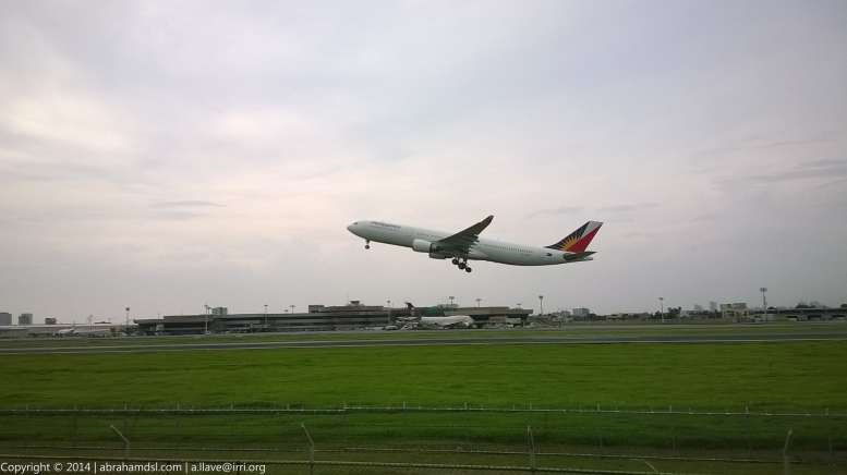 A Philippine Airlines (PAL) aircraft taking off.